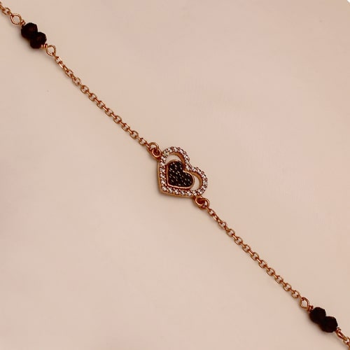 Βραχιόλι 14K ροζ χρυσό με ζιργκόν & μαύρο όνυχα